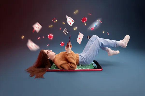 A glamorous woman holding casino chips in a neon-lit environment, representing the premium online casino atmosphere of 9SL.